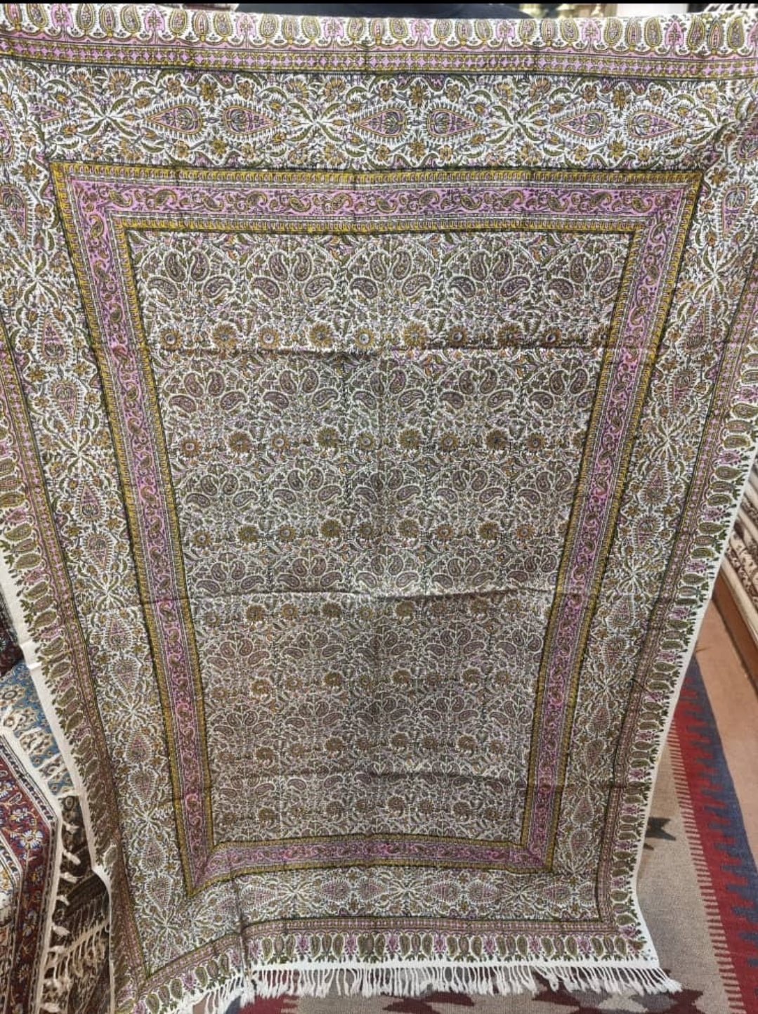 block printed cotton textile – floral paisley, pink edition with intricate patterns in soft tones.