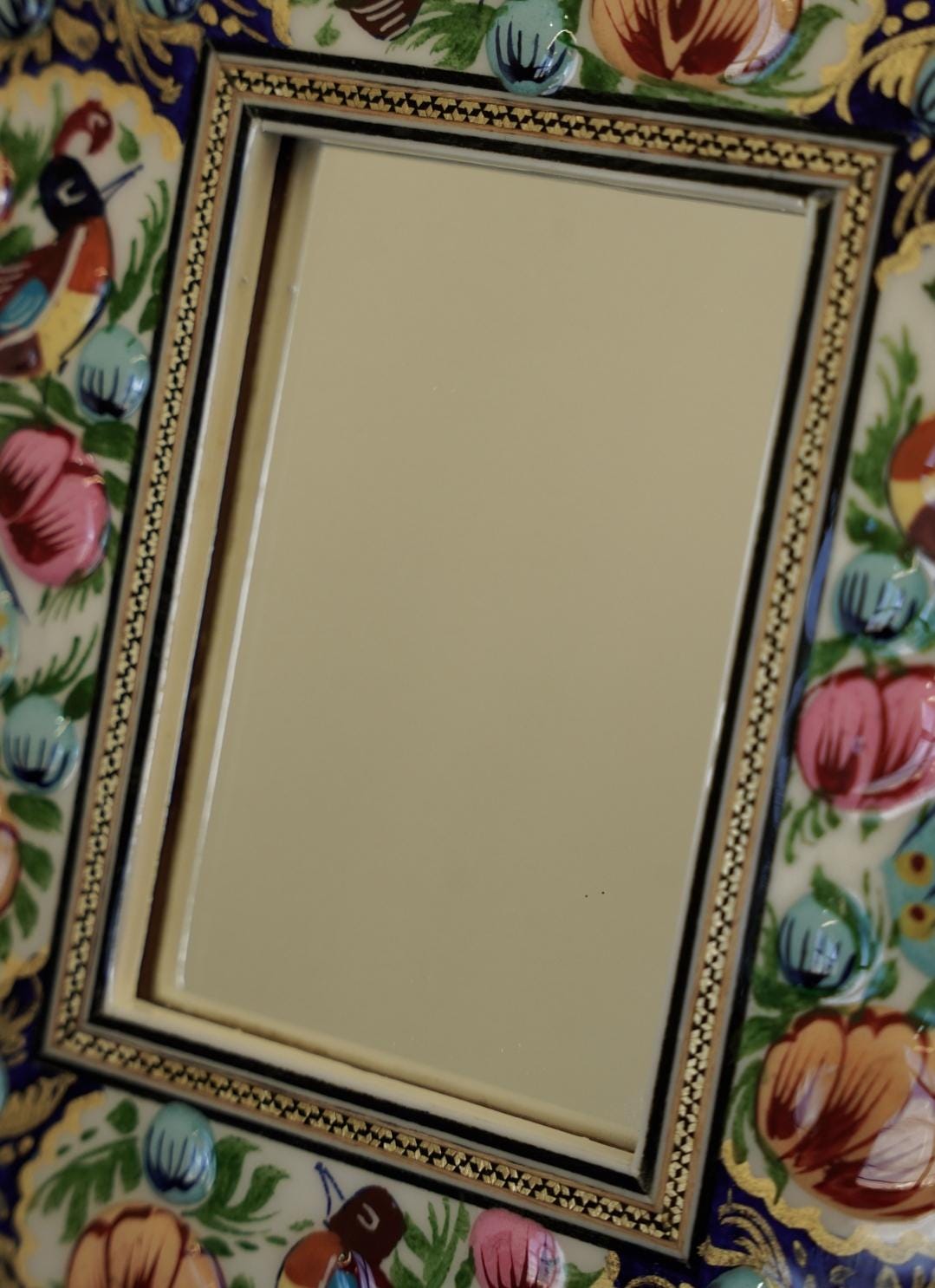 hand-painted mirror with relief enamel frame – bird & bloom design- light blue flowers (23×19 cm)