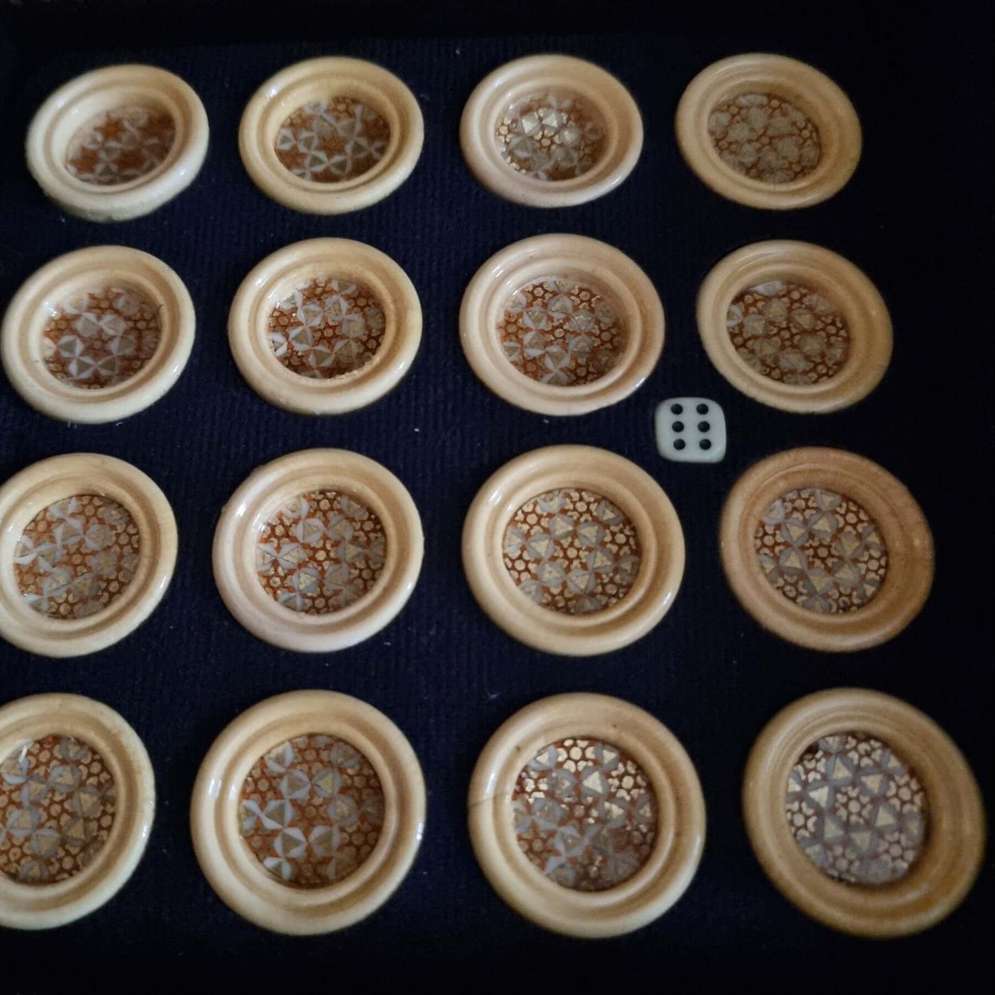 khatam backgammon checkers set featuring handcrafted game pieces with intricate inlaid designs.