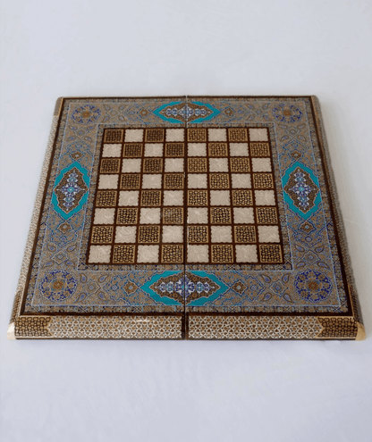 Handcrafted backgammon chess set opened, showing detailed backgammon interior