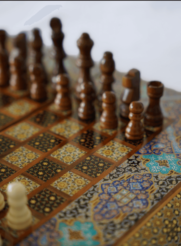 Tazhib Chess & Backgammon compact chess and backgammon set featuring intricately designed pieces and board.