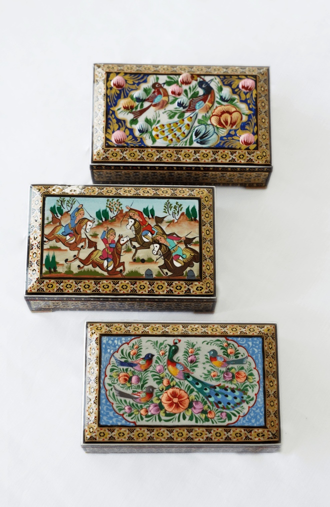 Handmade wooden jewelry box – Peacock Garden in three unique art variants with vibrant patterns.