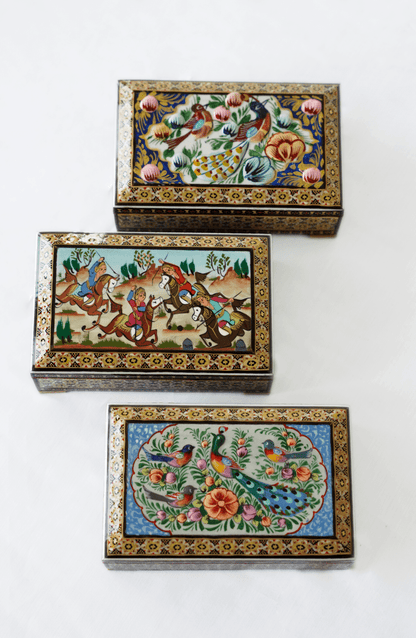 Handmade wooden jewelry box – Peacock Garden in three unique art variants with vibrant patterns.