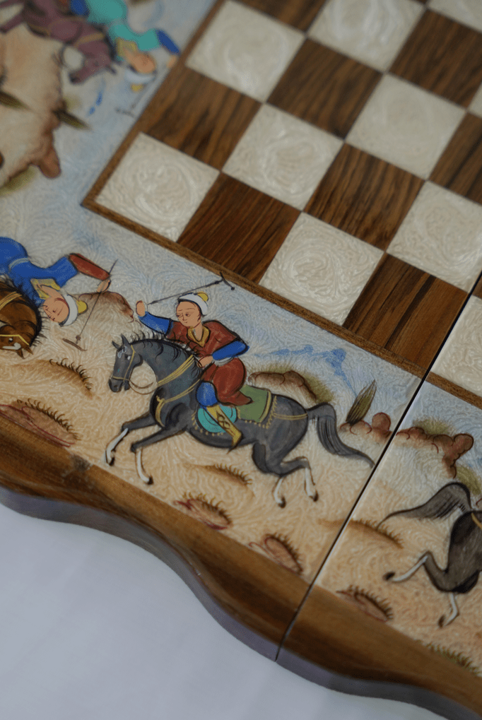 detailed view of the polo scene chess backgammon set featuring hand-painted figures on the board.