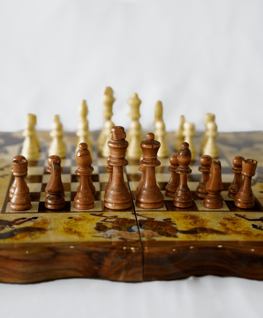 polo marquetry chess backgammon set featuring hand-painted chess pieces on an intricately designed board.