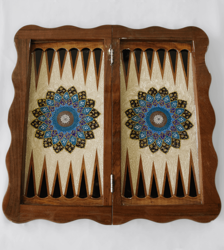 tazhib marquetry chess and backgammon set detailed with intricate blue floral designs on a wooden board.