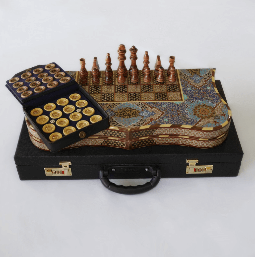 Hand-painted chess and backgammon set featuring a decorative reversible board by Pilardi Atelier.