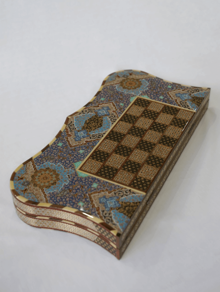 Hand-painted chess and backgammon set with intricate floral design, showcasing the collector edition craftsmanship by Pilardi.