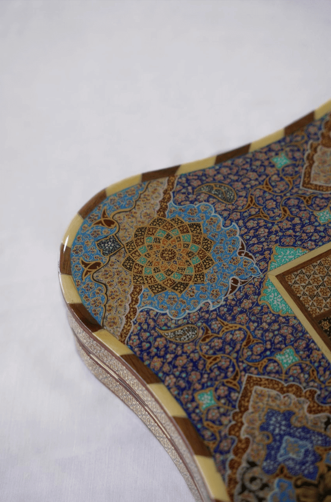 Detail of the hand-painted chess and backgammon set showcasing intricate floral patterns and designs.