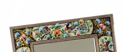 Hand-painted relief enamel mirror with vibrant bird and bloom design, showcasing intricate texture and color.