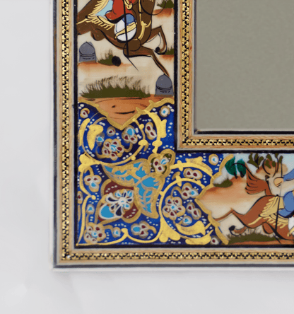 Hand-painted polo scene mirror – close-up of intricate details and vibrant indigo frame design.