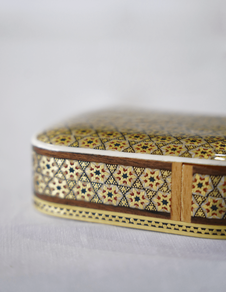 handmade wooden keepsake box with intricate khatam marquetry design and a smooth, glossy finish.