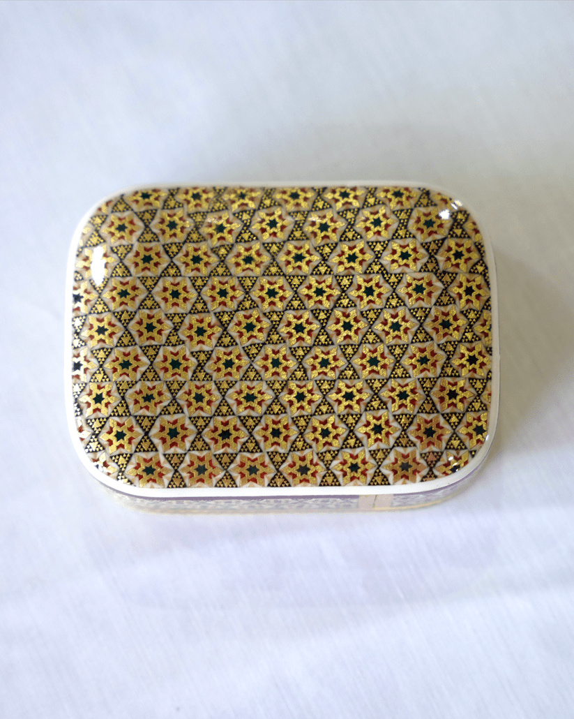 Handmade wooden keepsake box with traditional Khatam marquetry design, finished with a shiny protective resin layer.