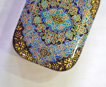 Handmade wooden keepsake box featuring a hand-painted Tazhib mandala in vibrant colors and intricate gold detailing.