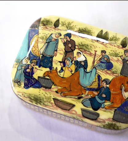Handmade wooden keepsake box featuring hand-painted scenes of traditional life with camels and people.