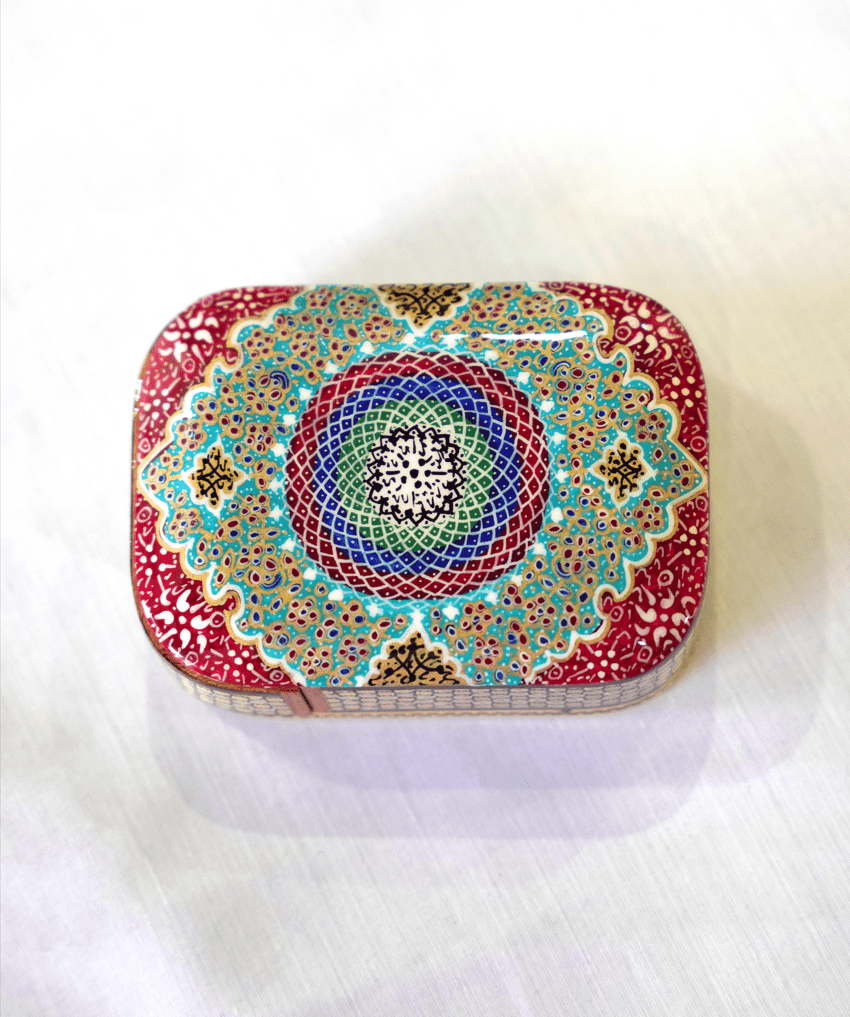 handmade wooden trinket box featuring vibrant mandala artwork with intricate detailing in the rangin design.