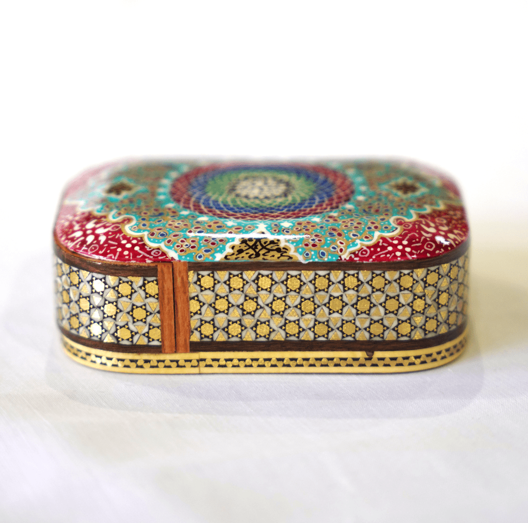 Handmade wooden trinket box featuring vibrant mandala artwork in traditional Persian style.