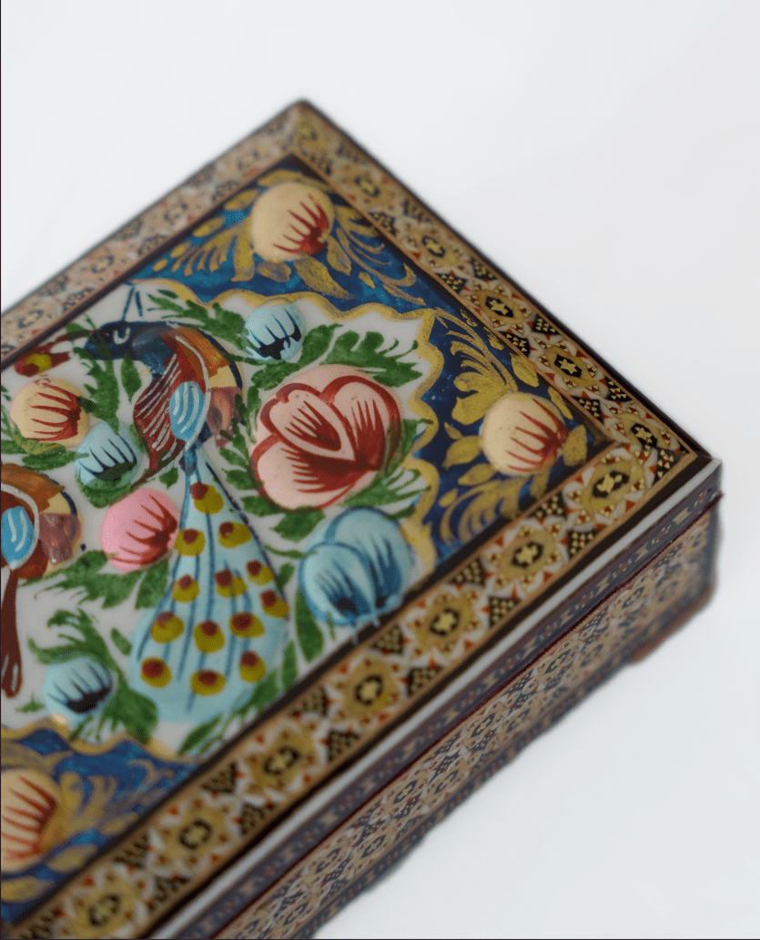 handmade wooden jewelry box featuring hand-painted floral design and textured details, crafted with traditional techniques.
