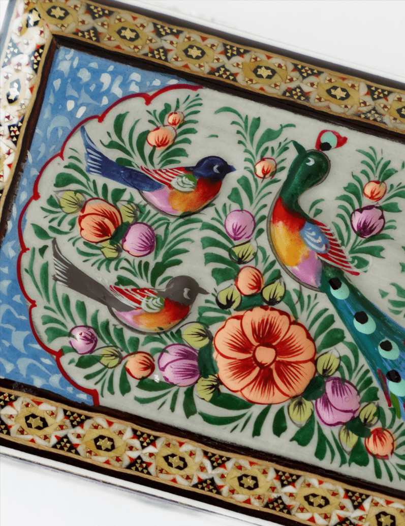 handmade wooden jewelry box featuring hand-painted peacock and birds in vibrant colors and floral designs.