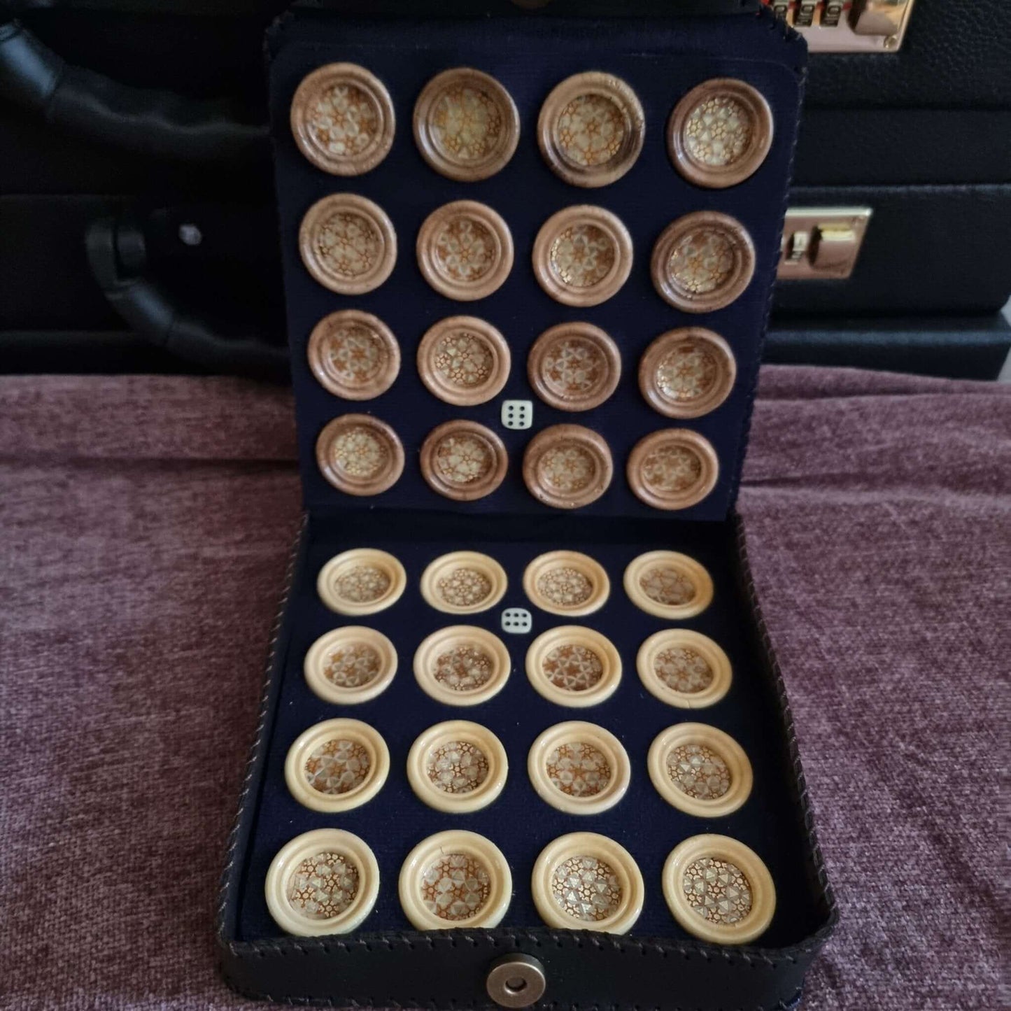 premium khatam backgammon checkers set featuring handcrafted marquetry game pieces in a stylish storage case.