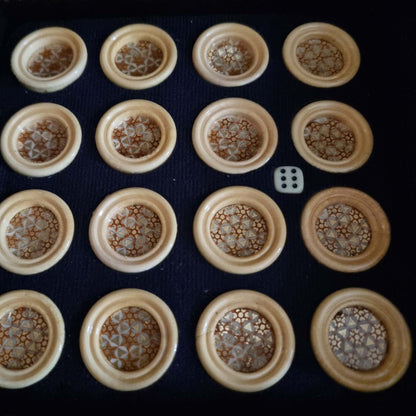 Khatam backgammon checkers set featuring handcrafted game pieces with intricate inlaid designs.